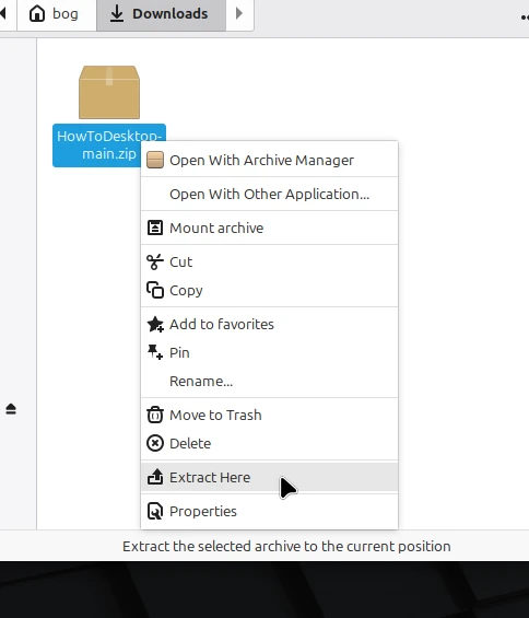 The Extract Here option in the context menu.